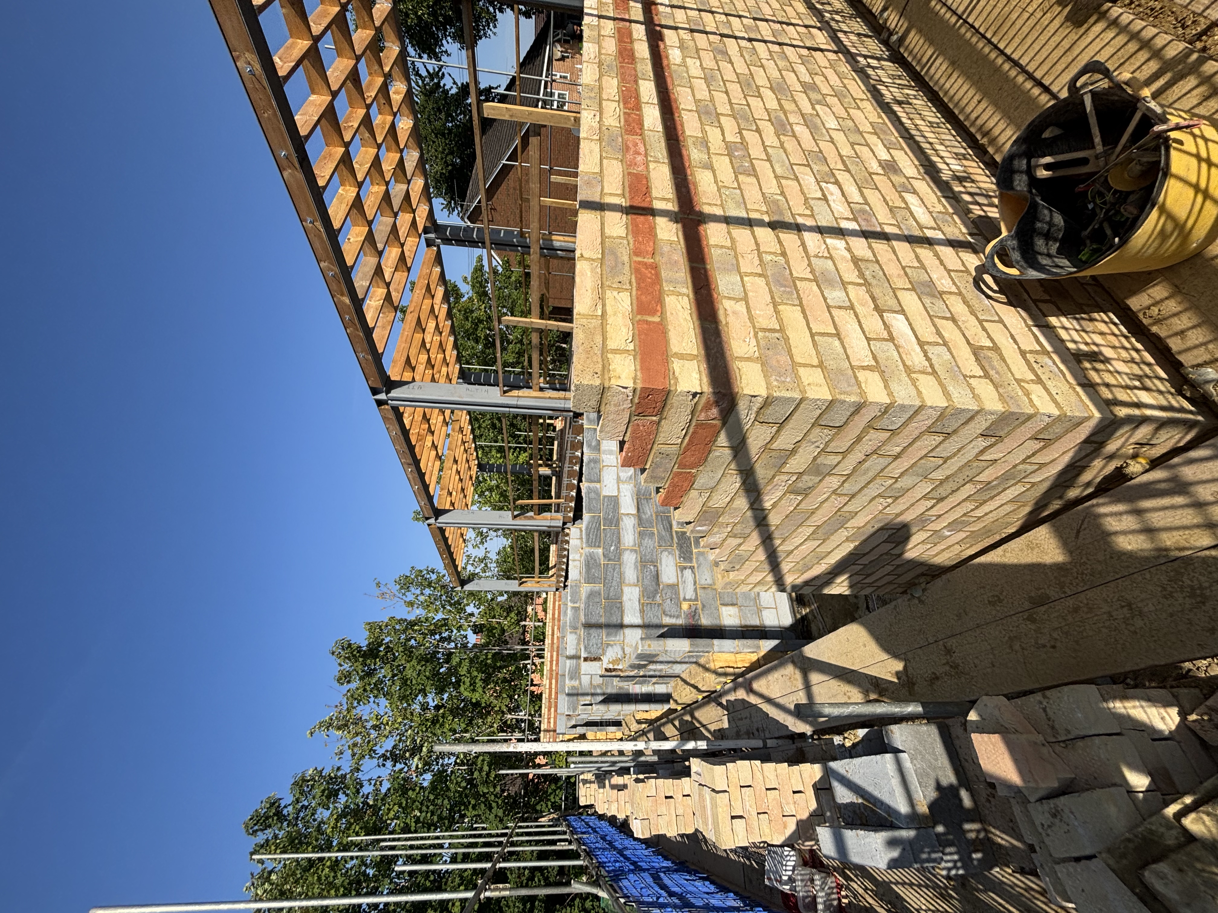 Brickwork rising first floor cavity wall and steel frame